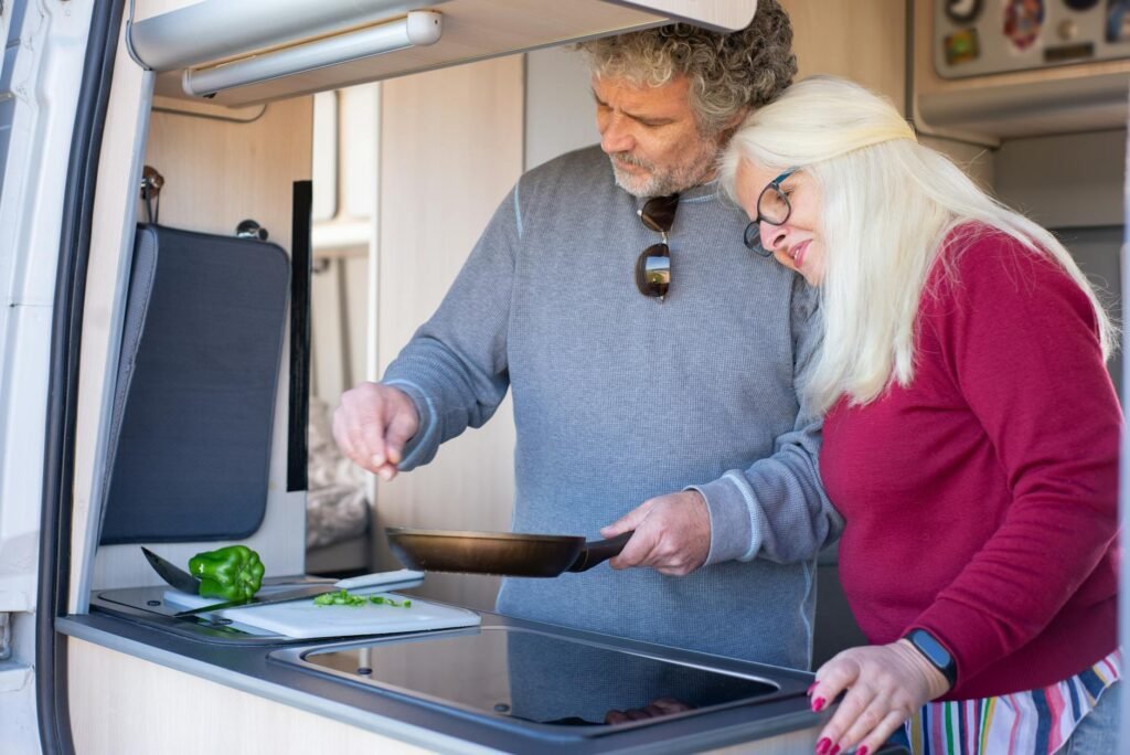 Motorhome service point with fresh water and waste facilities demonstrating campsite jargon and connection terminology