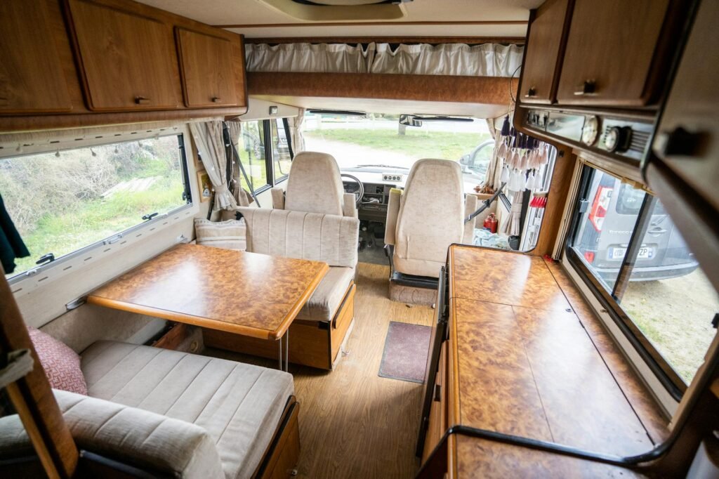 Family caravan setup at UK campsite with tow car detached for local trips