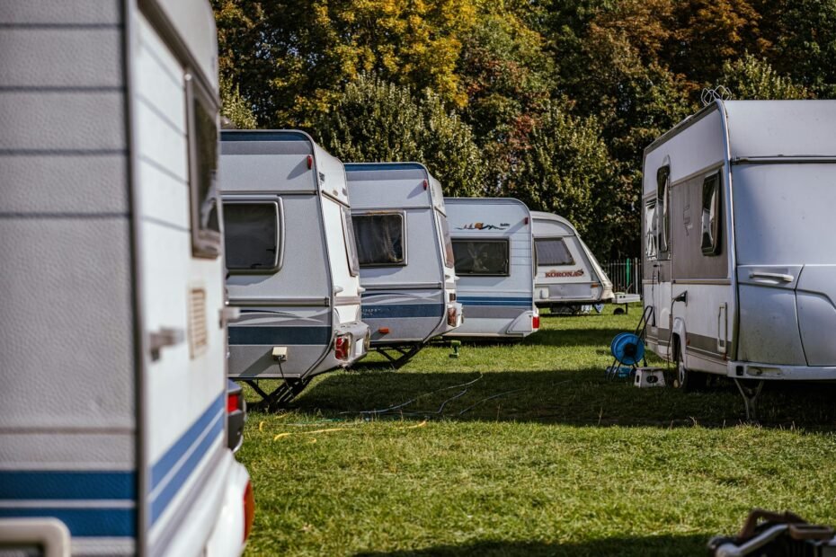 Motorhome parked at a scenic campsite during daylight hours illustrating the 3-3-3 rule for safe and relaxed travel